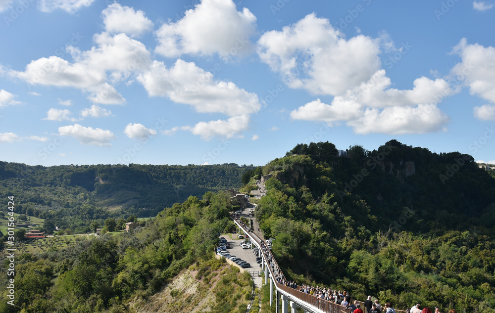 Obraz premium Beautiful panoramic view of famous Civita di Bagnoregio with Tiber river valley, Lazio, Italy. The site became known in Italian as La città che muore, The Dying Town. View from Civita.