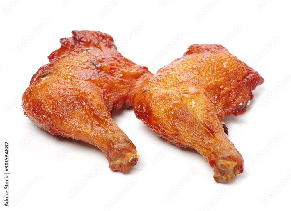 Barbecued chicken leg on white background Barbecued chicken leg on white background