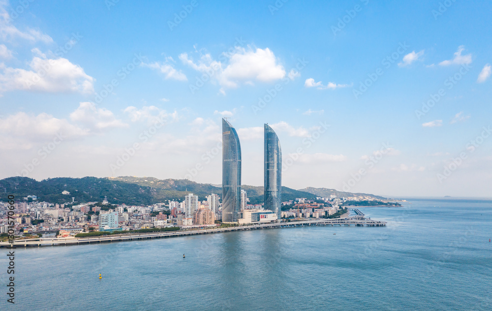 Panorama view of the Conrad Xiamen, Twin Towers/xiamen World Trade in Straits , including the Conrad Xiamen hotel, overlooking the South China Sea in Xiamen (Amoy), China. Panorama view of the Conrad Xiamen, Twin Towers/xiamen World Trade in Straits , including the Conrad Xiamen hotel, overlooking the South China Sea in Xiamen (Amoy), China.