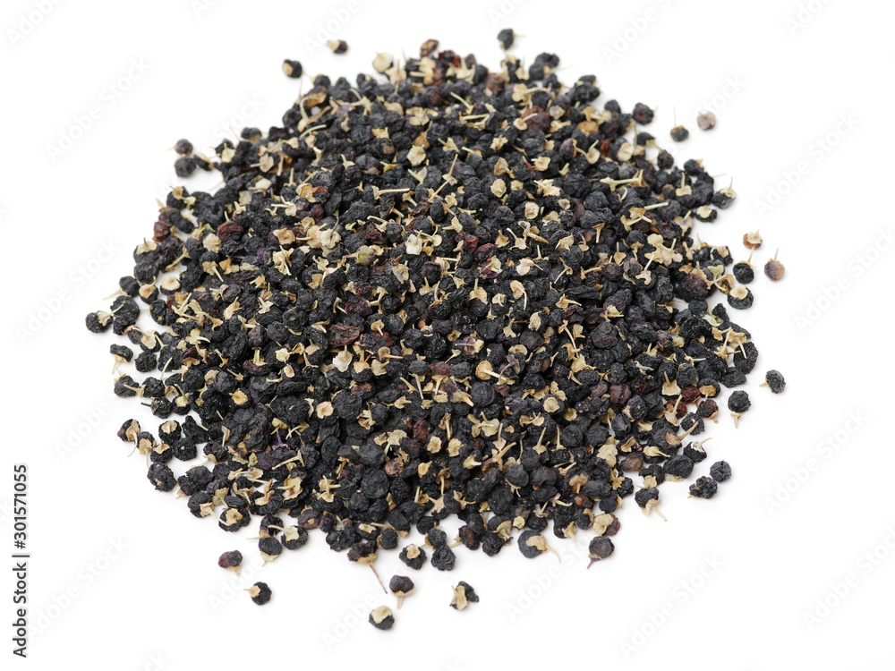 Traditional Chinese black herbs dried wolfberry on white background Traditional Chinese black herbs dried wolfberry on white background