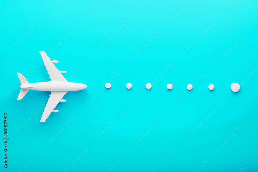 White plane on a blue background with a flexible and smooth trajectory of the route from white points.