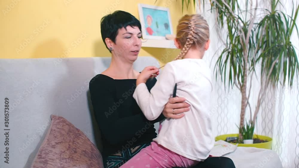 Mom lesbian cares for her daughter. Stock ビデオ | Adobe Stock 