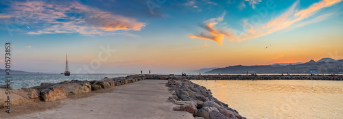 Panoramic coastal landscape with view on the Red Sea from walking stone pier ...