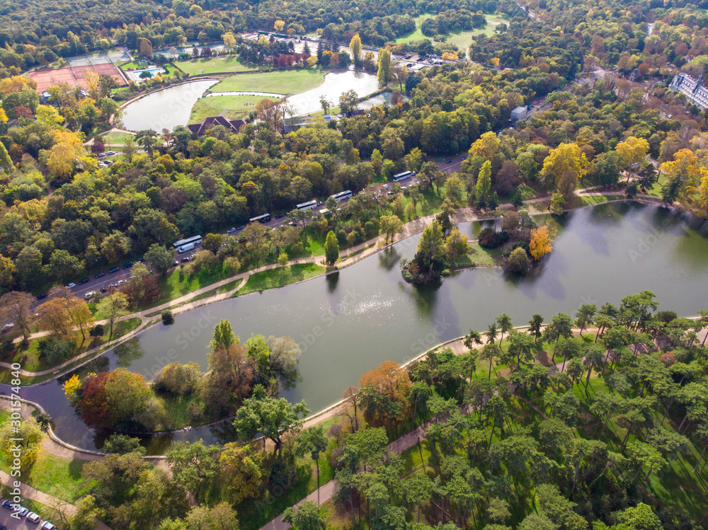 Aerial view above the park with pond and forest around. Boulogne, Paris, France