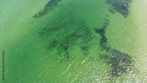 aerial footage of the ocean shore at Sagamore Beach on Cape Cod Massachusetts photo