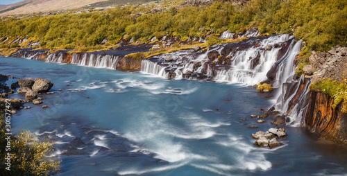 View of Colorful Hraunfossar Waterfall, Iceland photo