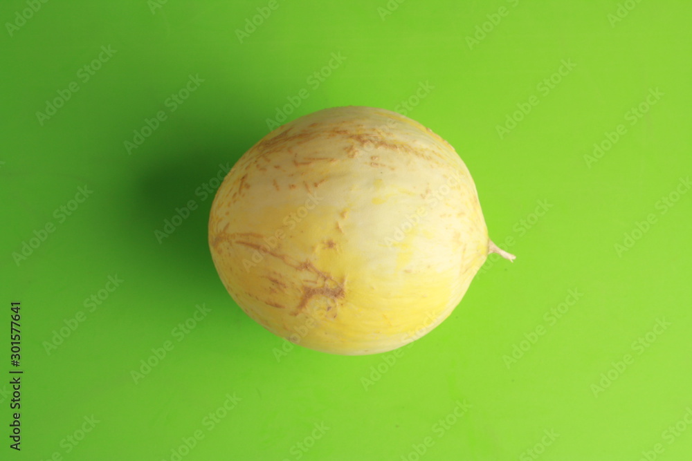 delicious melon grown in Spain on colorful background delicious melon grown in Spain on colorful background