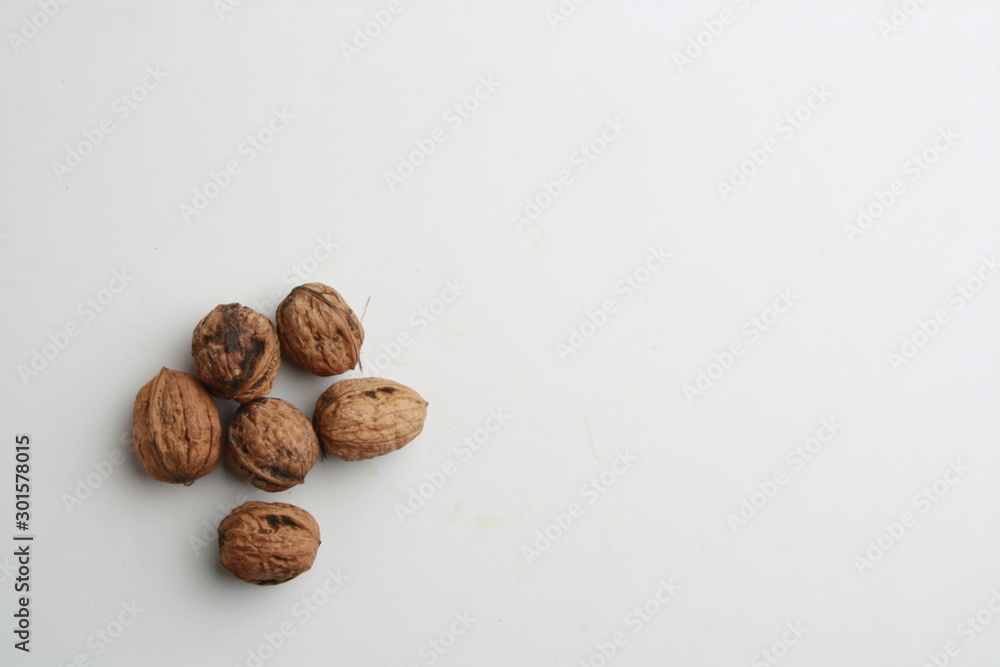 Garlic walnuts in color background Garlic walnuts in color background