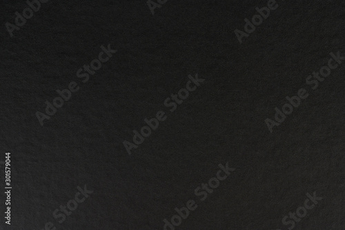 Plane dark gray paper background