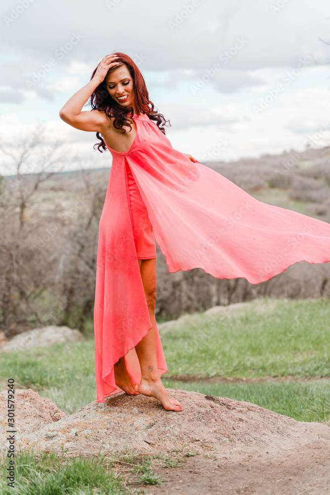 Beautiful girl playing and posing in the red dress! Beautiful girl playing and posing in the red dress!
