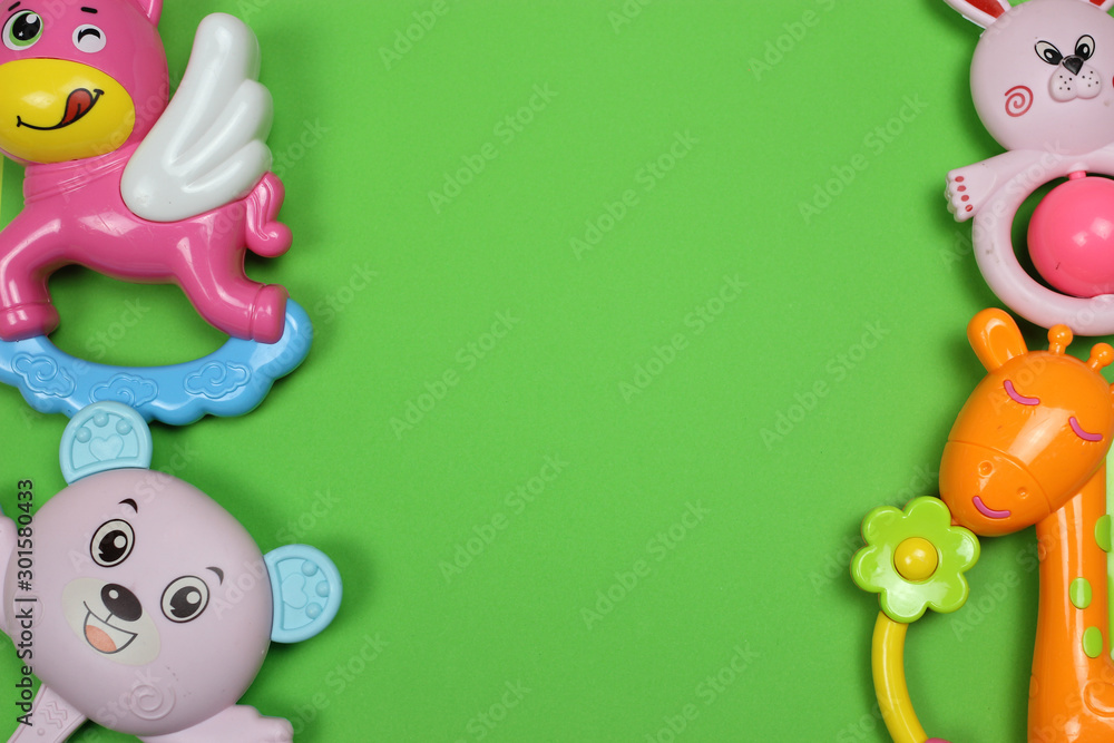 frame of toys on a colored background frame of toys on a colored background