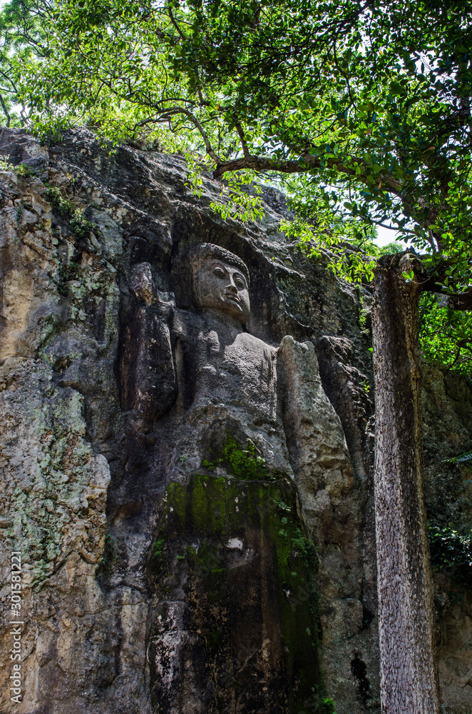 The unfinished Buddha image at Dhowa Raja Maha Vihara rock temple at Bandarawela, Sri Lanka The unfinished Buddha image at Dhowa Raja Maha Vihara rock temple at Bandarawela, Sri Lanka