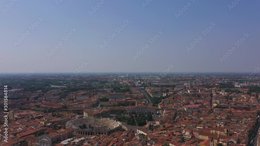Flight on the historic center of Verona, Italy. landscape with blue sky Flight on the historic center of Verona, Italy. landscape with blue sky