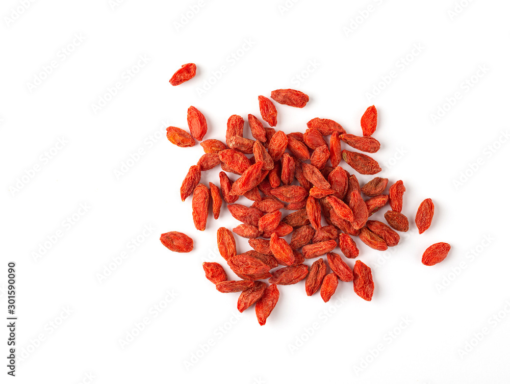 Goji berries close up on white background. Superfoods concept. Top view Goji berries close up on white background. Superfoods concept. Top view