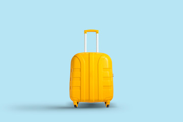 Yellow suitcase on a blue background. Travel and vacation concept in triples. Flat lay, top view