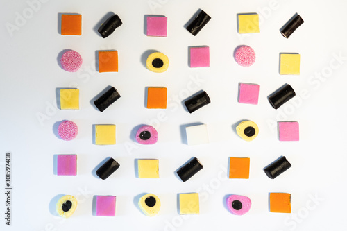 Licorice Allsorts in a orderly pattern. This candy is typical British.