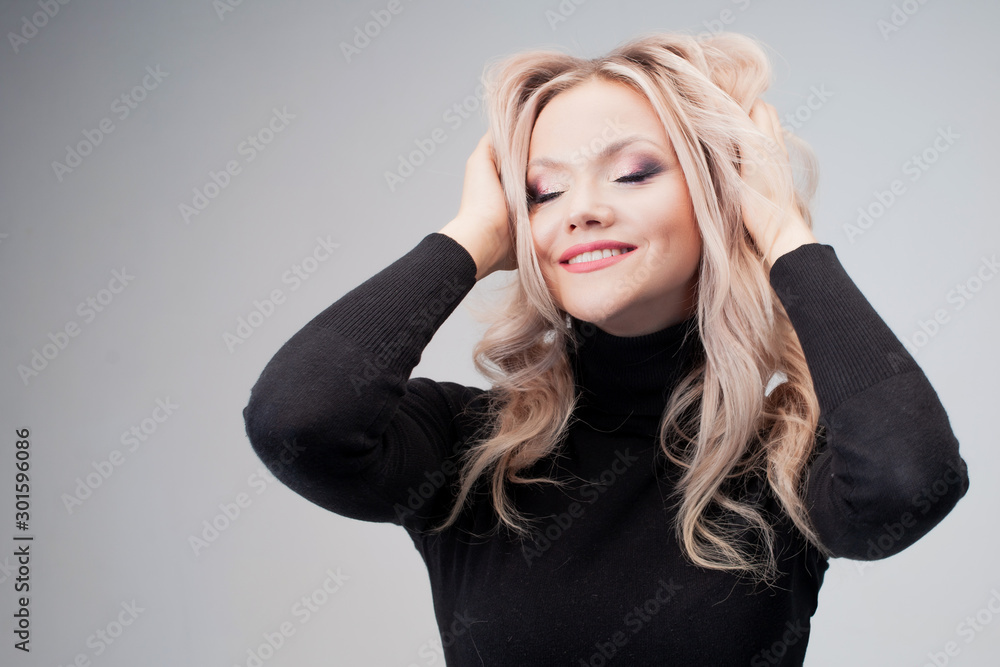 Charming blonde with sloppy curls, close-up Charming blonde with sloppy curls, close-up