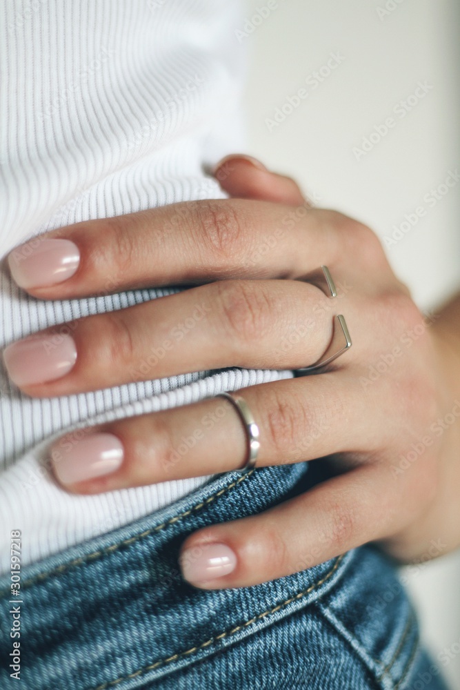 Tender jewerly on female hand, close up shot
