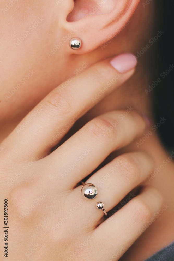 Tender jewerly on female hand, close up shot