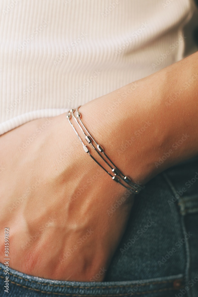 Tender jewerly on female hand, close up shot
