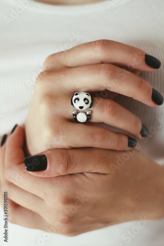 Obraz na płótnie Tender jewerly on female hand, close up shot w salonie