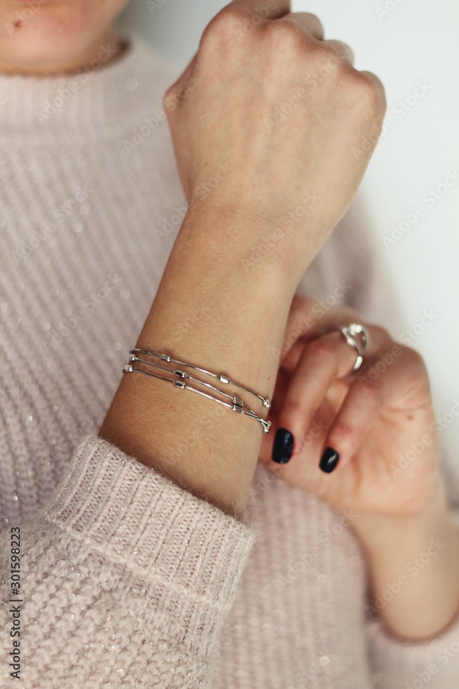 Tender jewerly on female hand, close up shot
