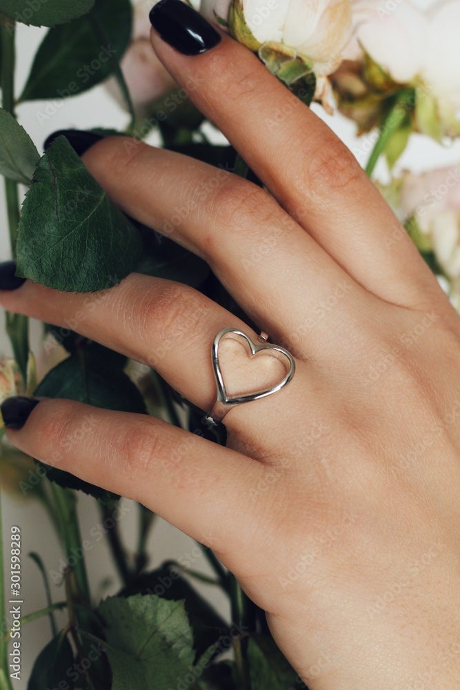 Tender jewerly on female hand, close up shot
