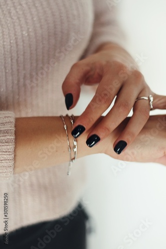 Tender jewerly on female hand, close up shot