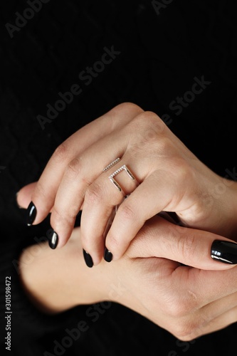 Obraz na płótnie Tender jewerly on female hand, close up shot w salonie
