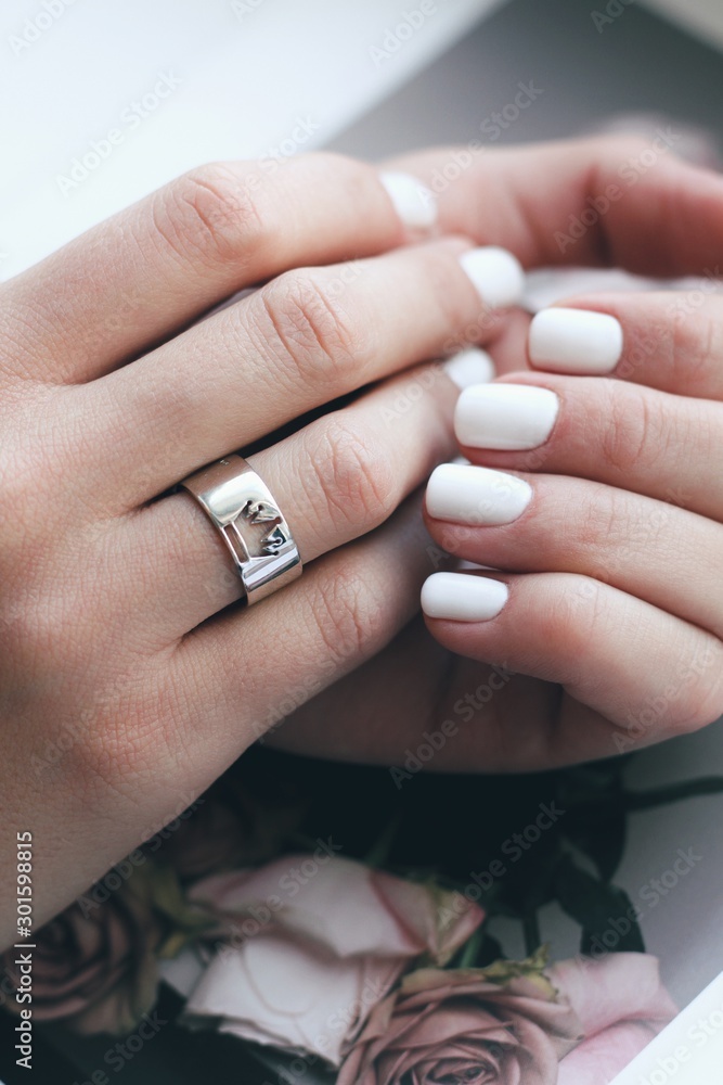 Tender jewerly on female hand, close up shot