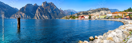 View of Torbole at the lakeside of Lake Garda in summer in the northern Italy. Torbole is a popular holiday location in Italy.