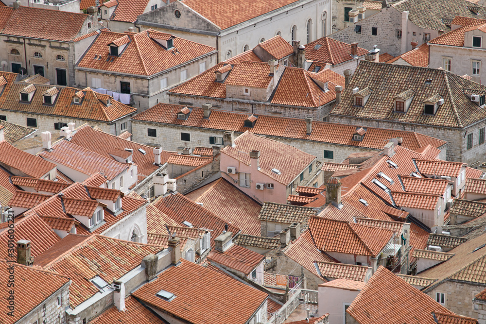 Tiled roofs of the old town of Dubrovnik in Croatia. Background. Terracotta color.