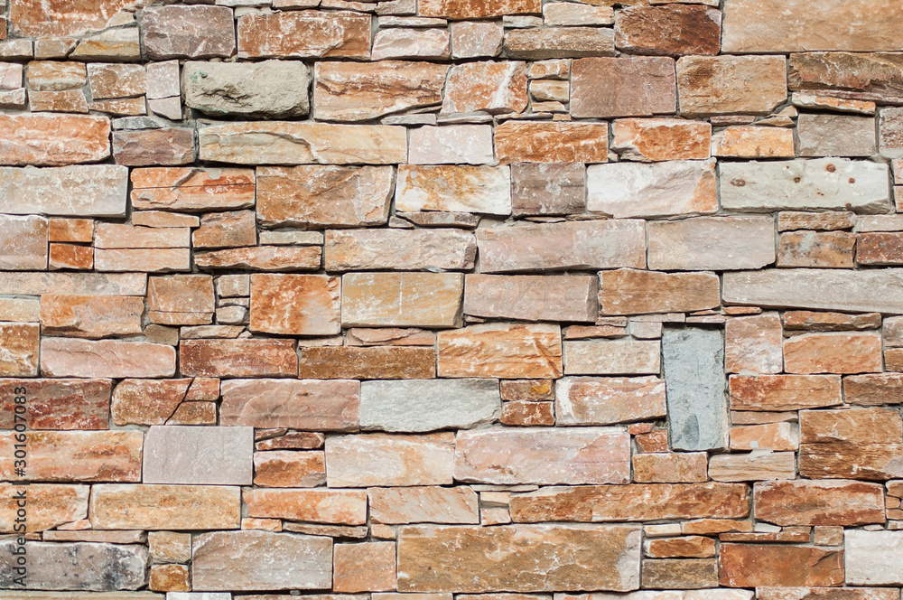Obraz premium Closeup of decorative stoned wall texture