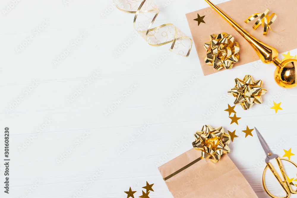 Christmas flat lay background of golden ornaments