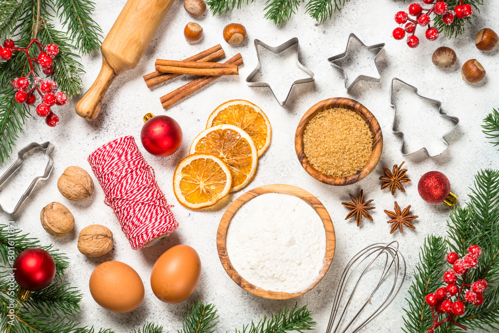 Christmas baking background on white table. Christmas baking background on white table.