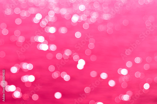 Pink background with blurred lights and bokeh