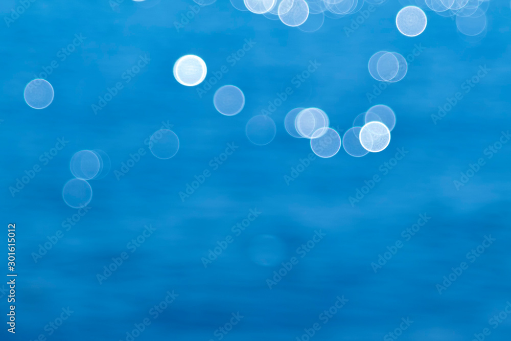 Blue background with blurred lights and bokeh