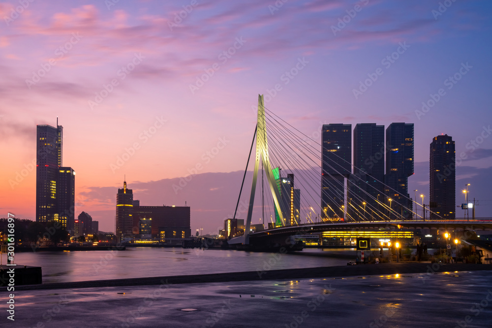 Rotterdam Skyline with Erasmusbrug bridge in the morning, Netherlands. Rotterdam Skyline with Erasmusbrug bridge in the morning, Netherlands.