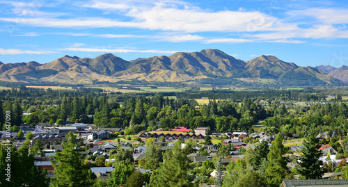 The small town Hanmer Springs in New Zealand with mountains in the background. Canterbury, South Island.
