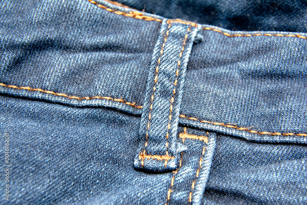 Worn denim jeans texture with stitches / Abstract jeans texture background Worn denim jeans texture with stitches / Abstract jeans texture background