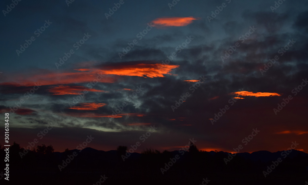 Dramatic sky at sunset over New Zealand, South Island.