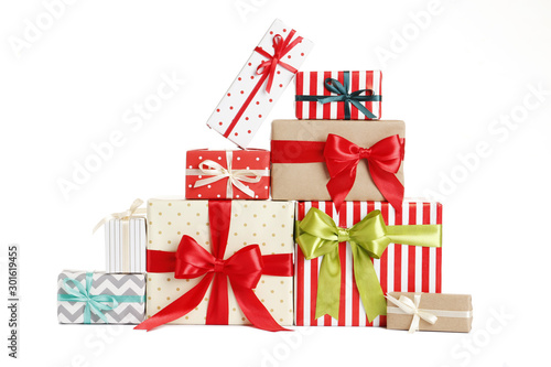 Many different Christmas gift boxes isolated on white