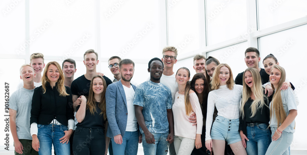 Obraz premium group of successful young people standing together.