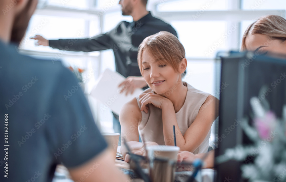 young business woman sitting at office Desk young business woman sitting at office Desk