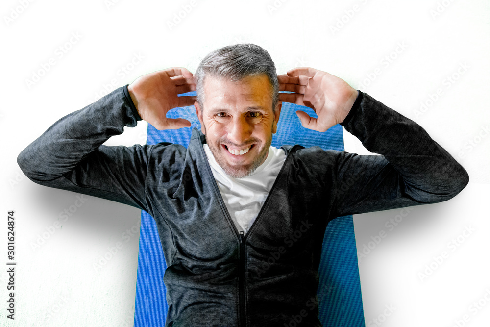 Closeup portrait of caucasian man doing sits up Closeup portrait of caucasian man doing sits up
