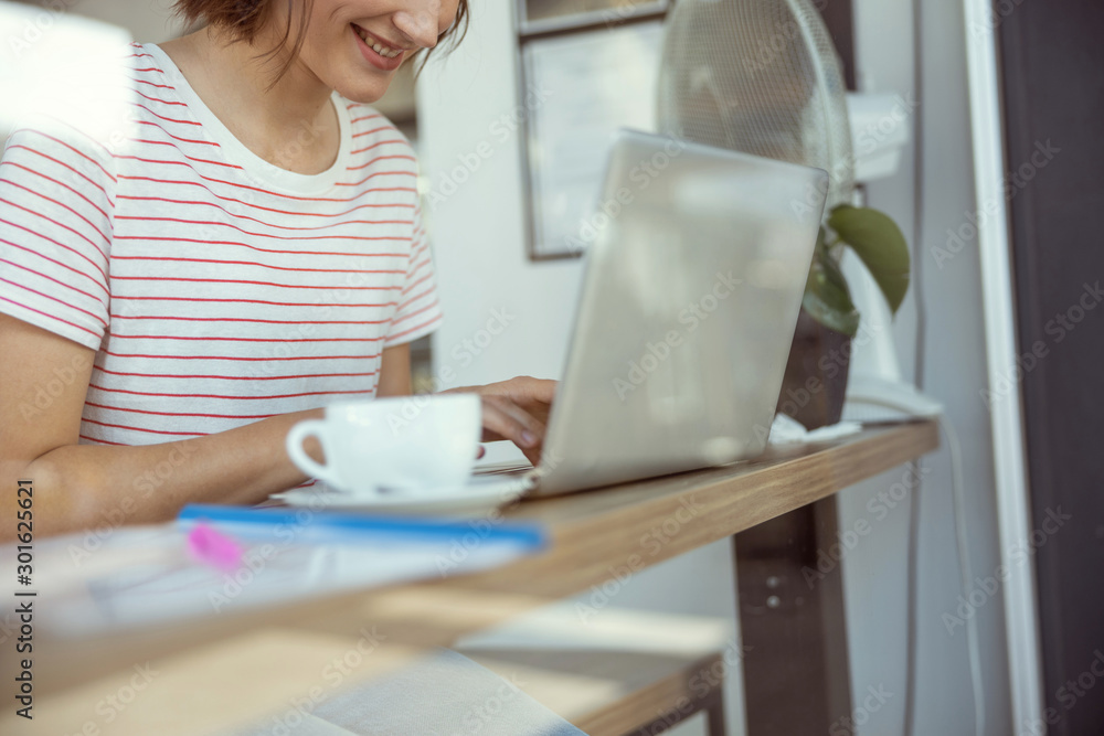Close up of happy girl that working with laptop Close up of happy girl that working with laptop