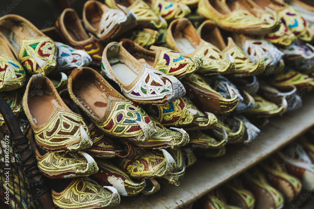 Traditional arabic shoes on the local market bazaar in Dubai. Stock Photo |  Adobe Stock