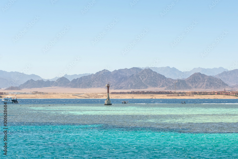 Red sea Tiran island Bay Akaba Light beacon rocks Sharm El Sheikh in Egypt