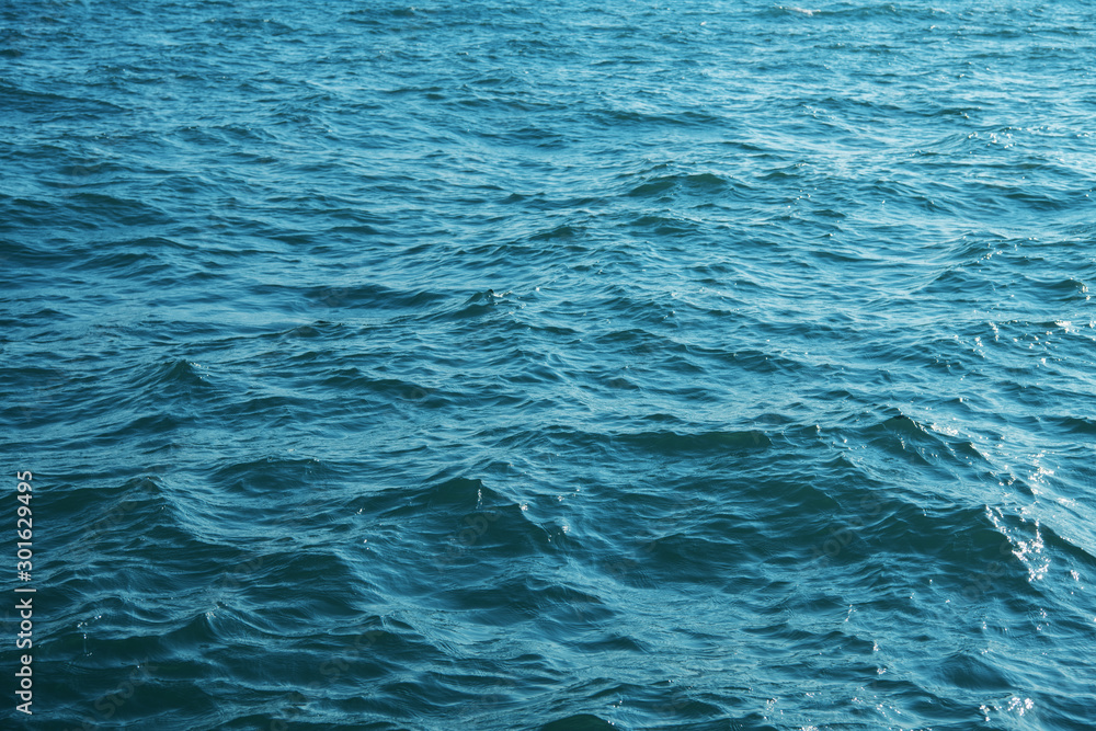 Obraz premium Blue sea water background texture