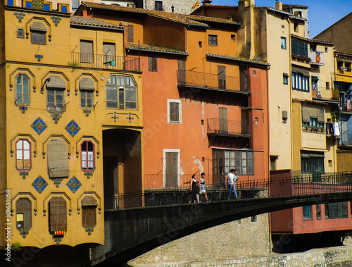 colorful houses and bridge in Girona, Spain photo